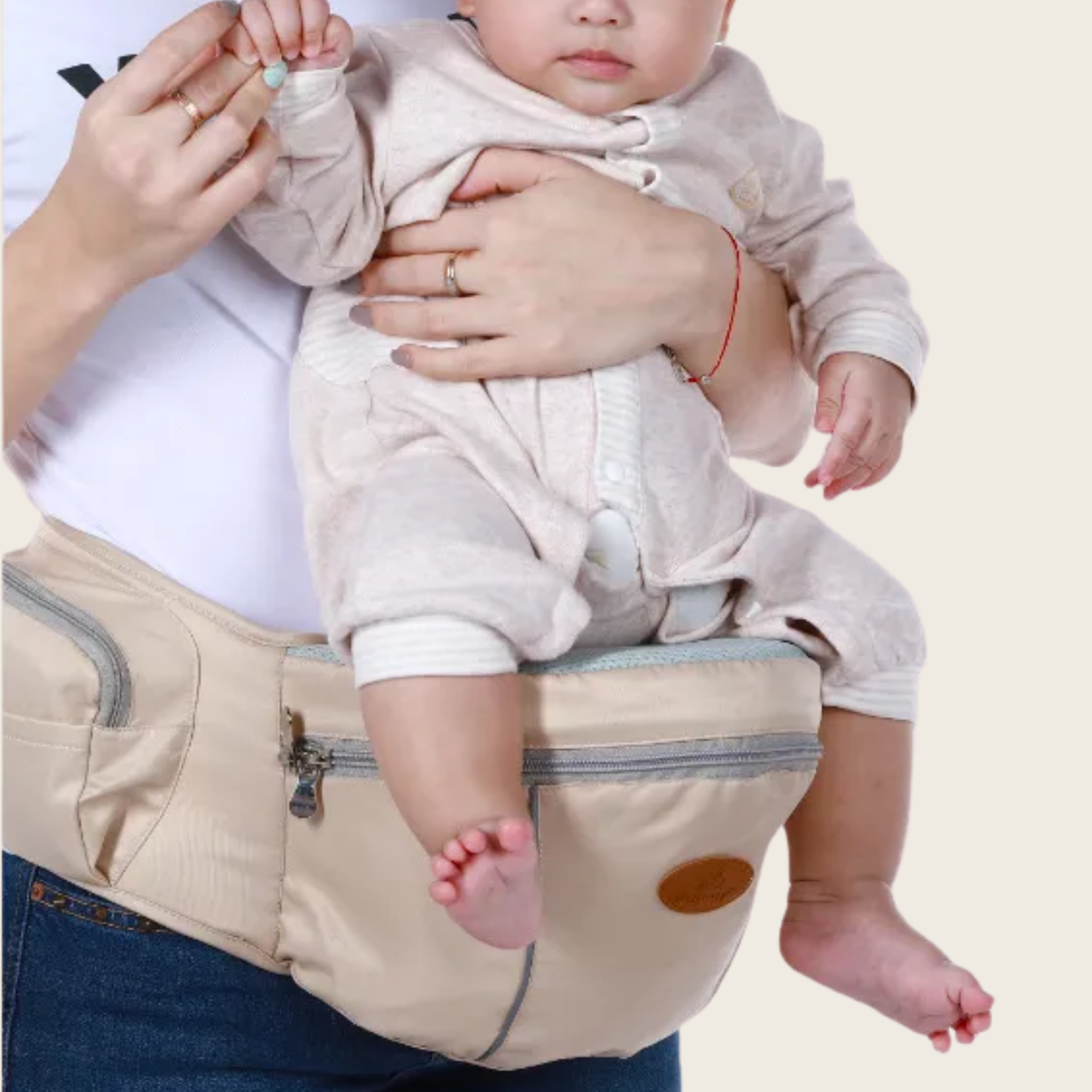 position en M recommandée pédiatres bébé assis porte-bébé hanche Nourly
